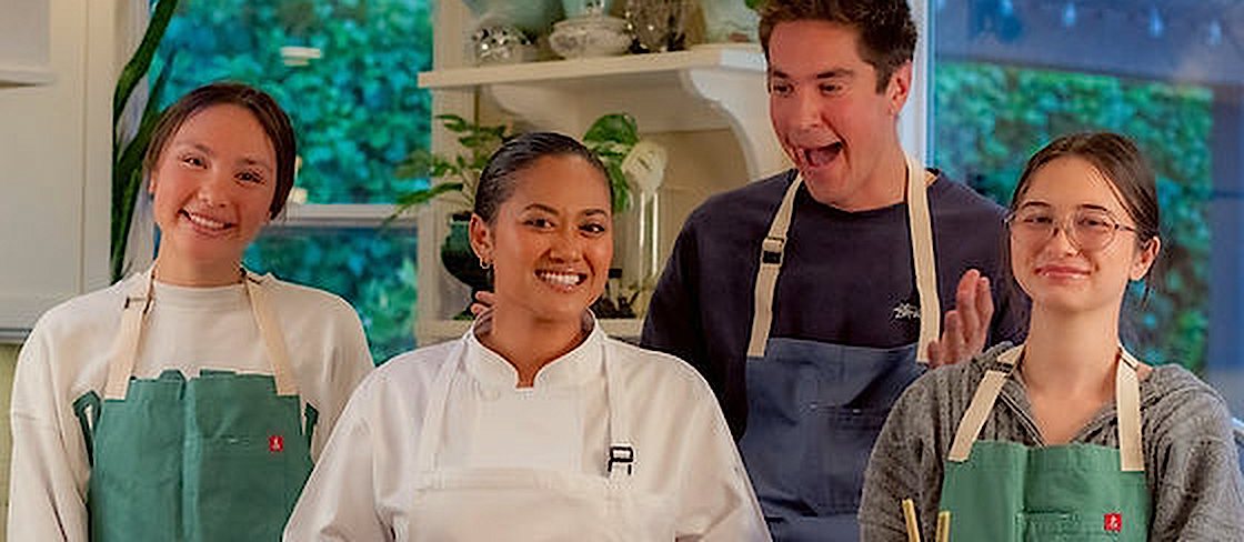 Chef Kimberly cooking on television with fellow chefs